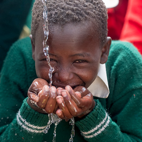 boy drinking clean water