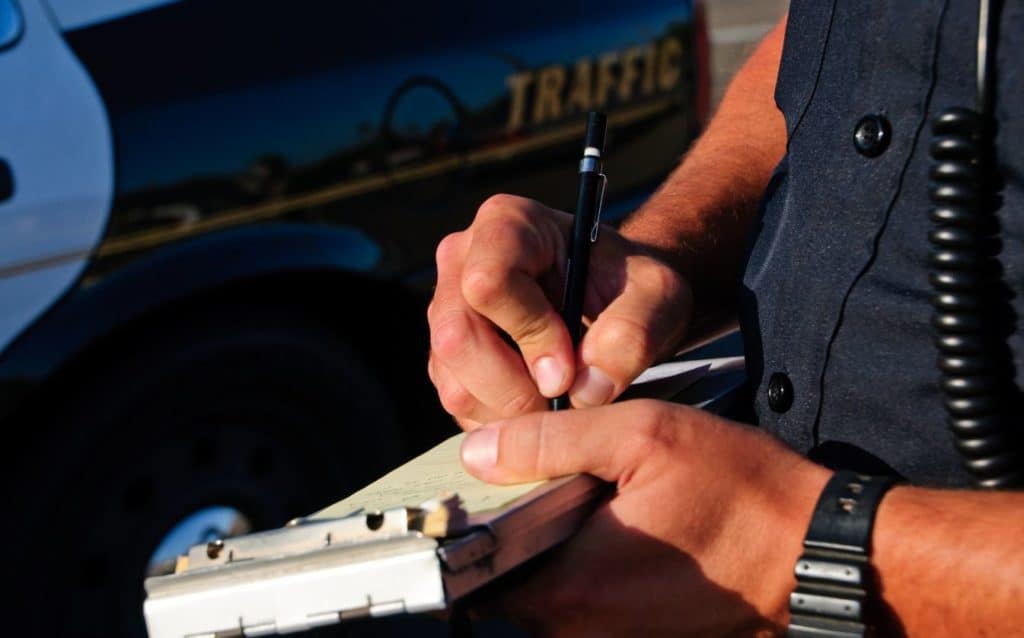 writing a traffic citation vs ticket