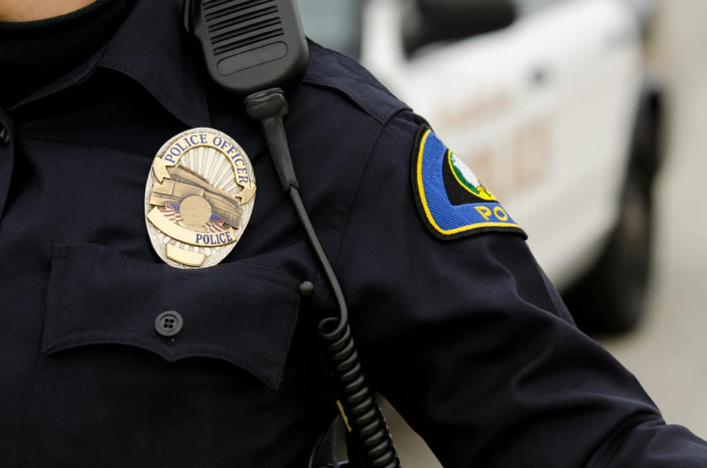 police officer with badge