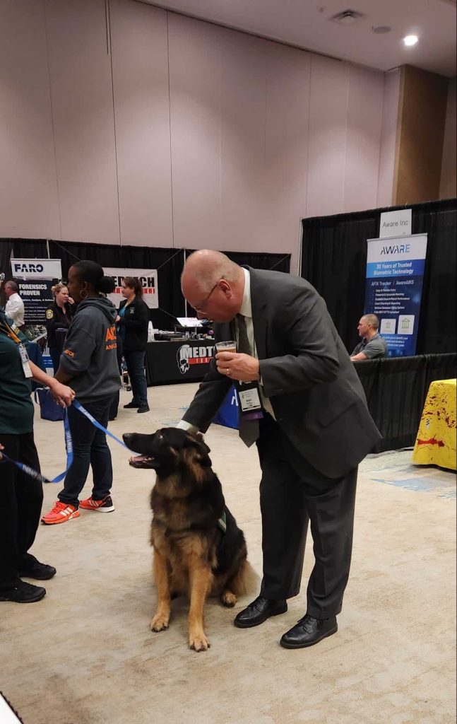 Andy with Therapy Dog at IAI Conference